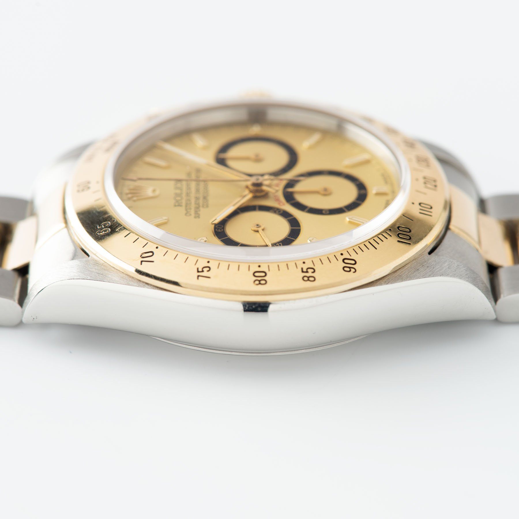 Rolex Daytona 16523 Champagne Four Line Dial with Papers