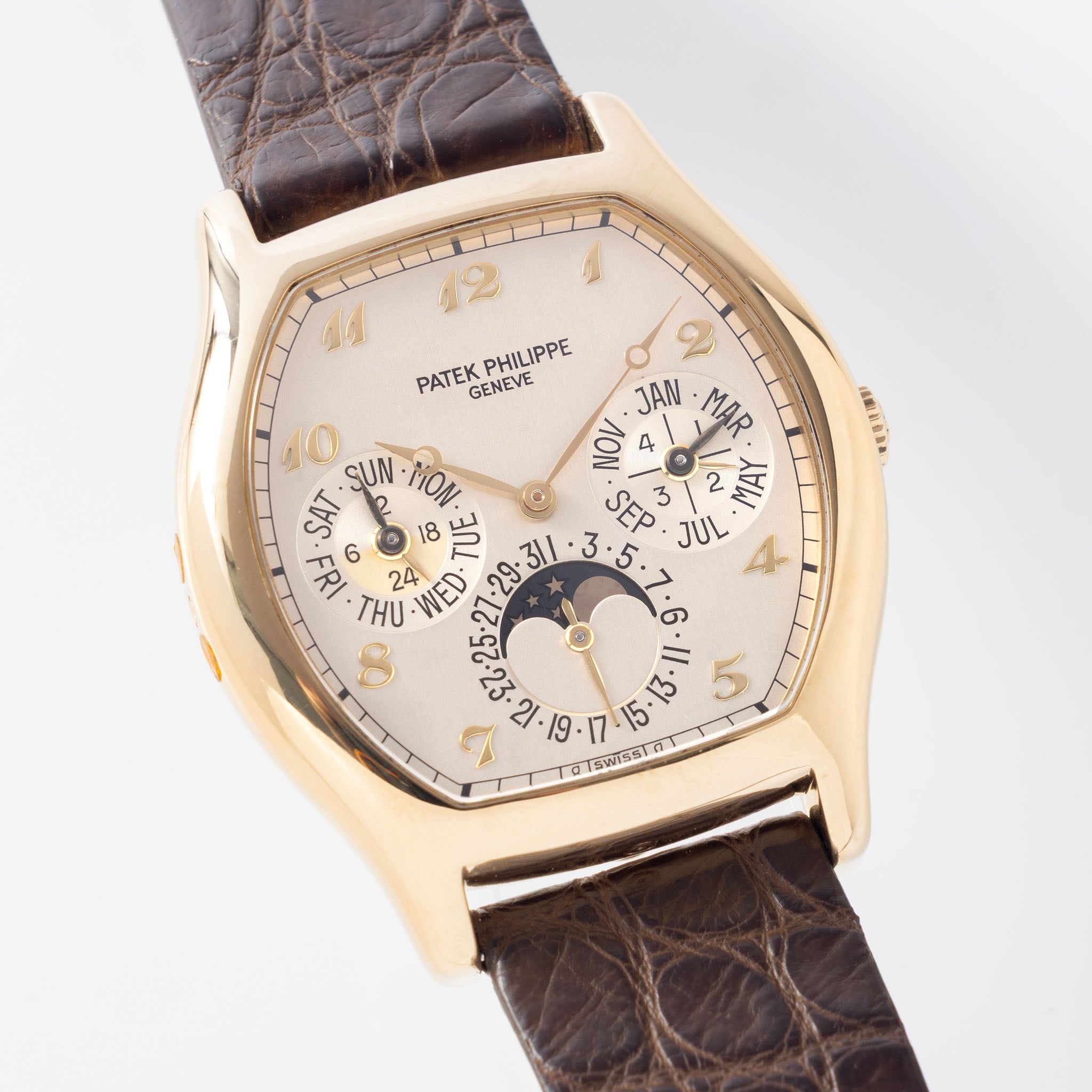 Patek Philippe Perpetual Calendar 5040J in 18k yellow gold Tonneau case with box and papers watch with Breguet numerals