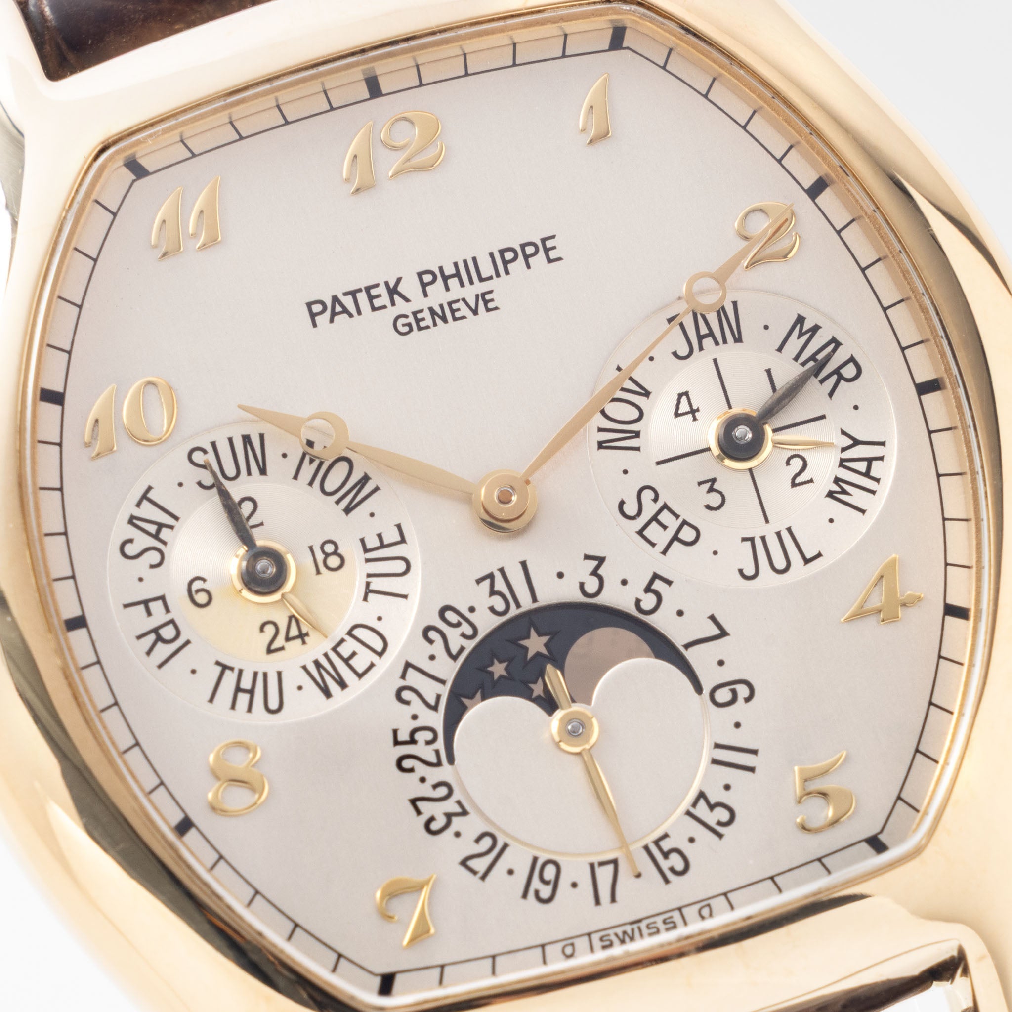 Patek Philippe Perpetual Calendar 5040J in 18k yellow gold Tonneau case with box and papers watch with Breguet numerals