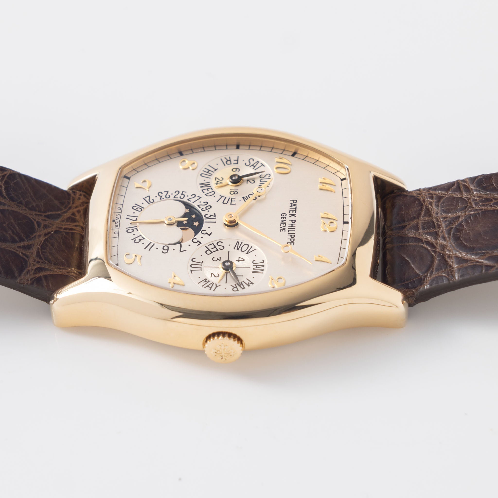 Patek Philippe Perpetual Calendar 5040J in 18k yellow gold Tonneau case with box and papers watch with Breguet numerals