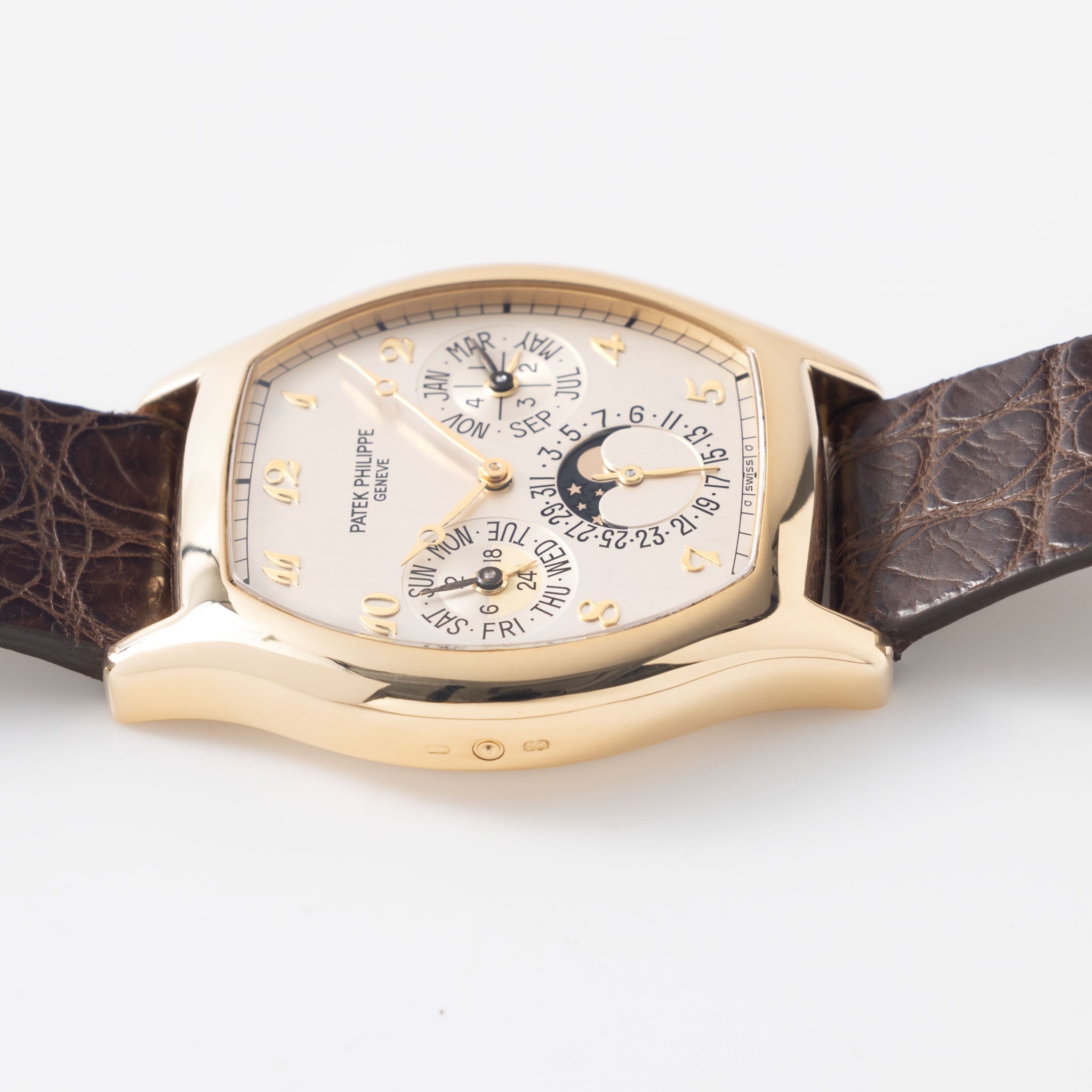 Patek Philippe Perpetual Calendar 5040J in 18k yellow gold Tonneau case with box and papers watch with Breguet numerals