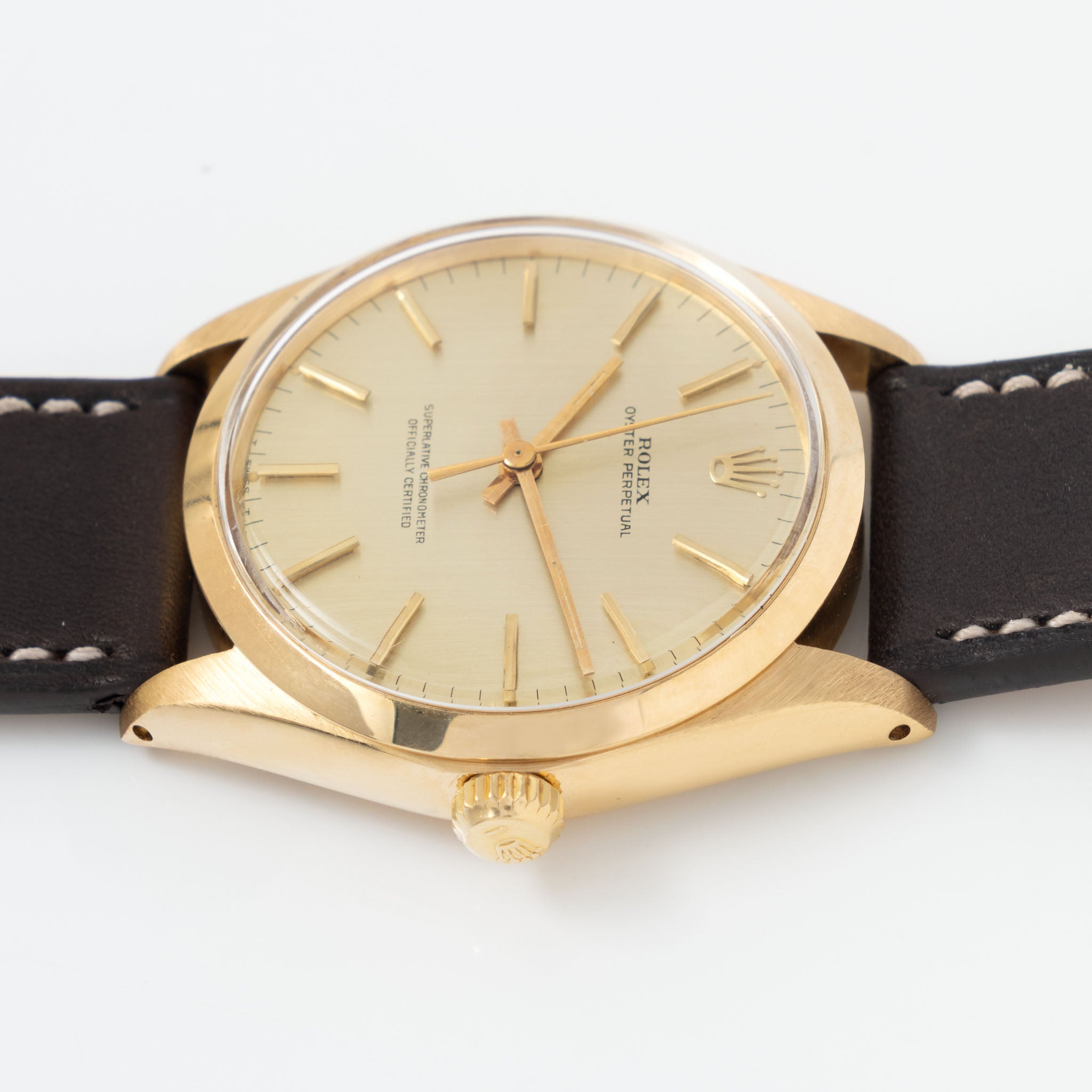 Rolex Oyster Perpetual 1002 Vertical Brush Champagne Dial in 18k Yellow Gold