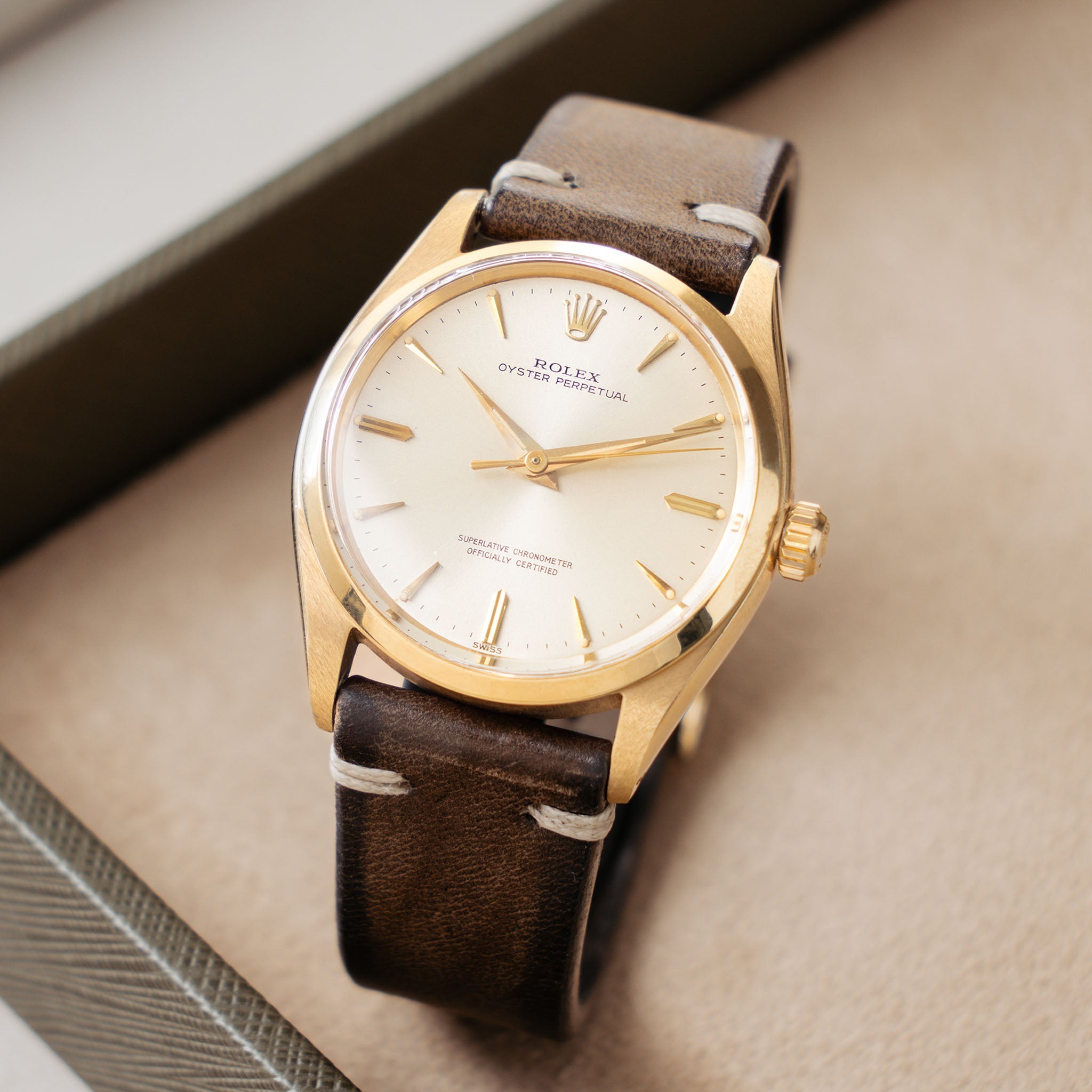 Rolex Oyster Perpetual 1002 Silver Soleil Swiss Only Dial in 18 k yell