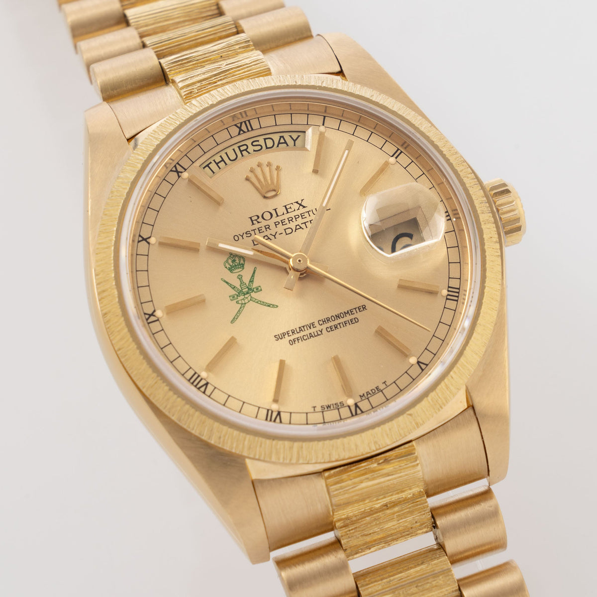 Rolex Day-Date 18078 Green Khanjar Champagne Dial Bark Finish in 18k Yellow Gold