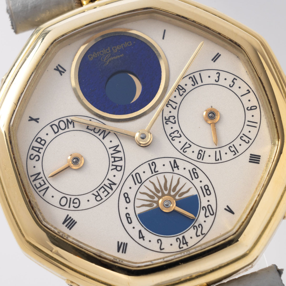 Gerald Genta “Succes “ Day date calendar moonphase with cream dial in 18 k yellow gold ref G2747