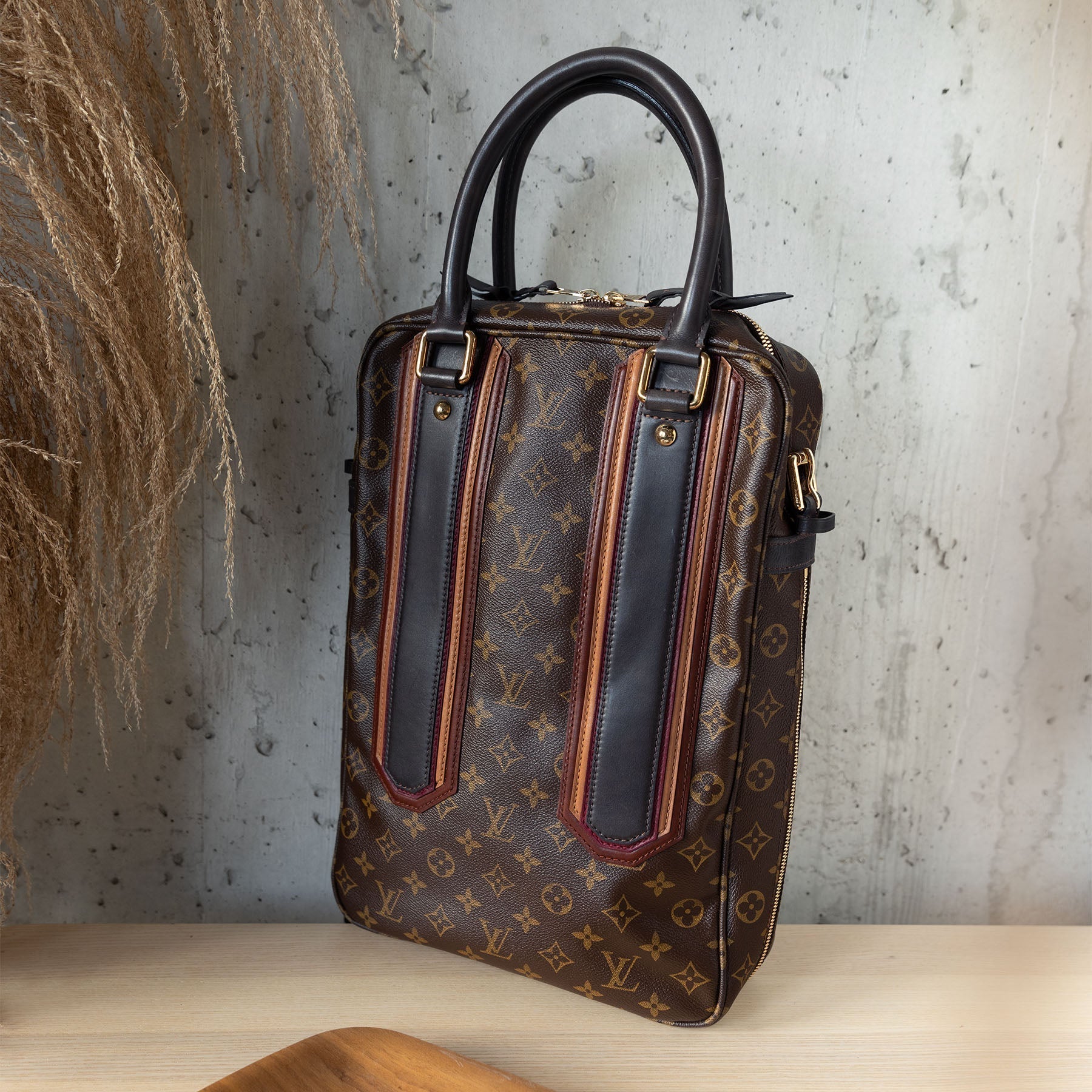 Louis Vuitton Monogram Bequia Porte Document Vertical Bag