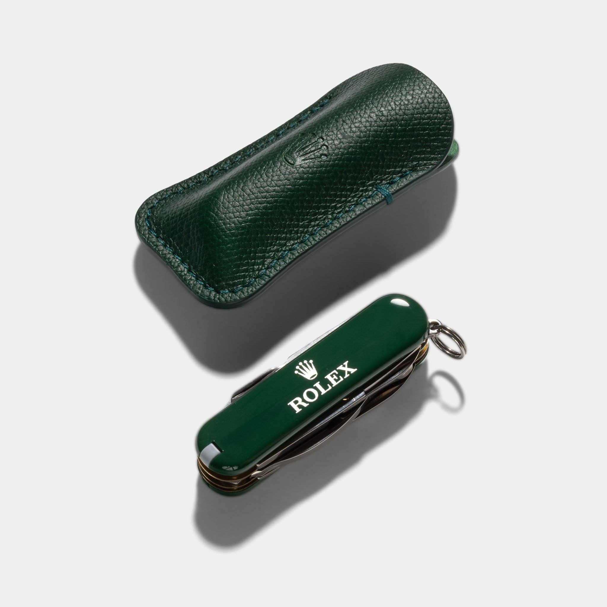 Rolex Green Victorinox Swiss army Pocket knife