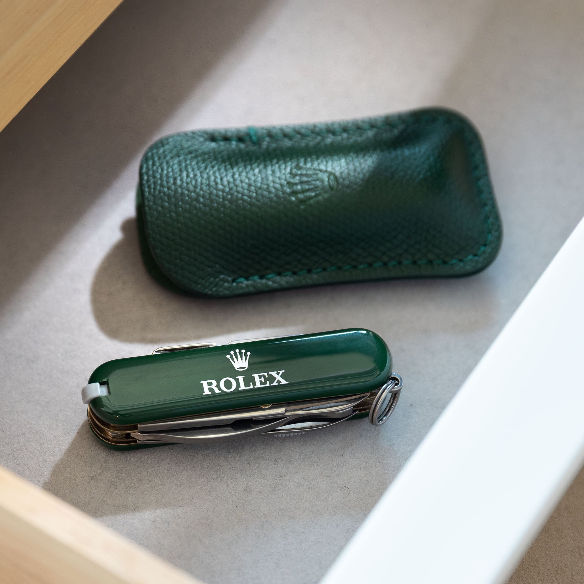Rolex Green Victorinox Swiss army Pocket knife