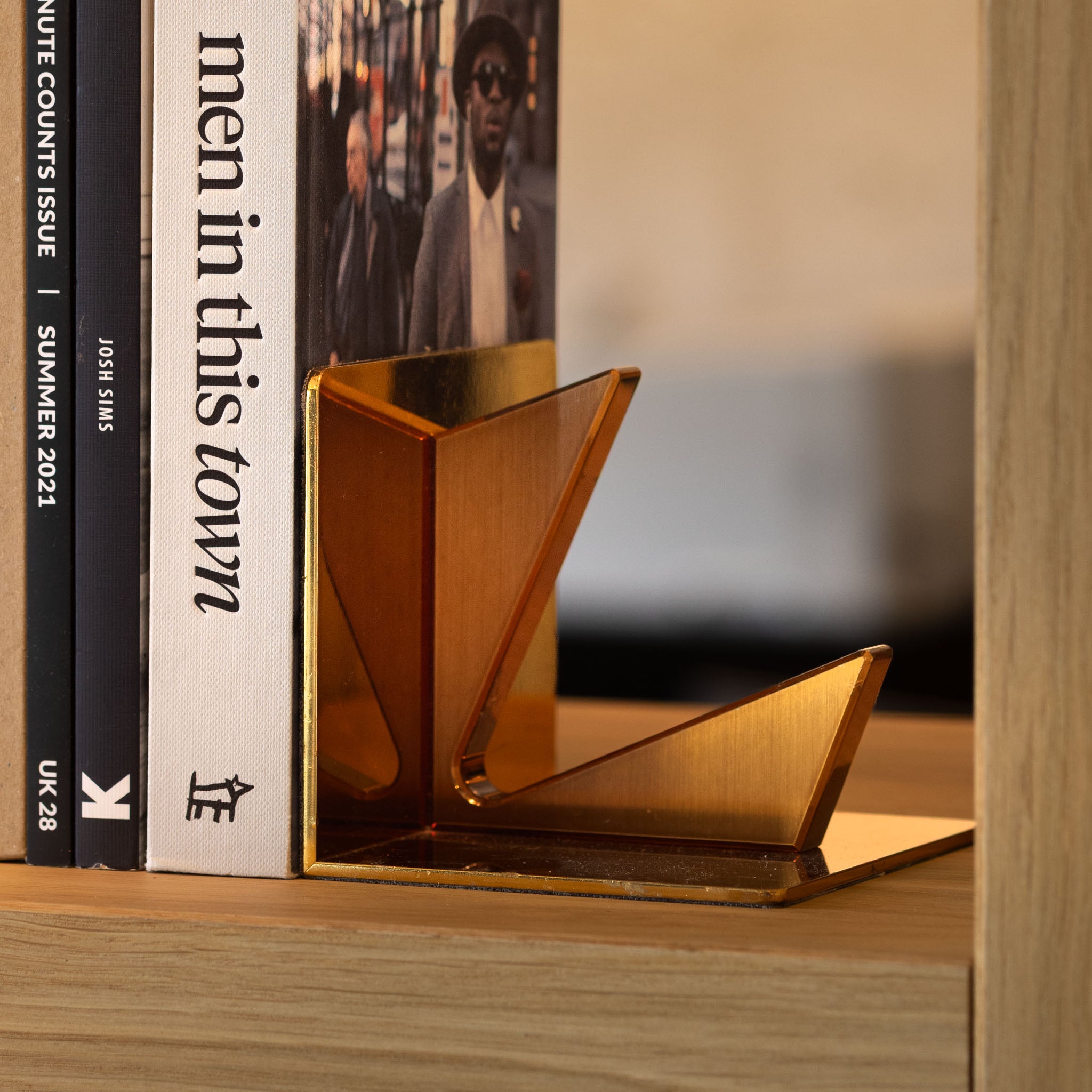 Vacheron & Constantin set of two brass bookshelves