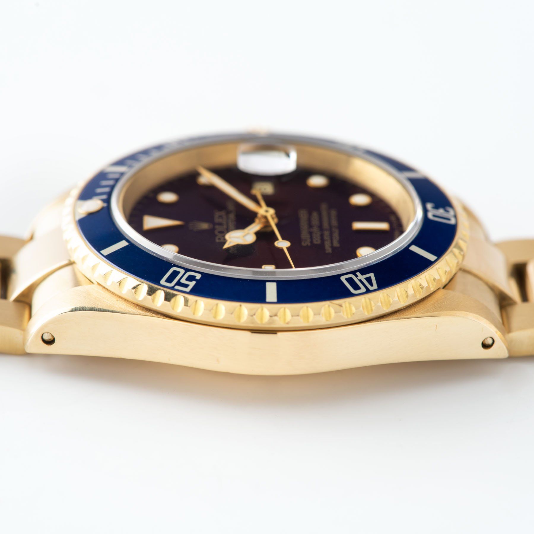 Rolex Submariner Date Purple Dial Yellow Gold 16618