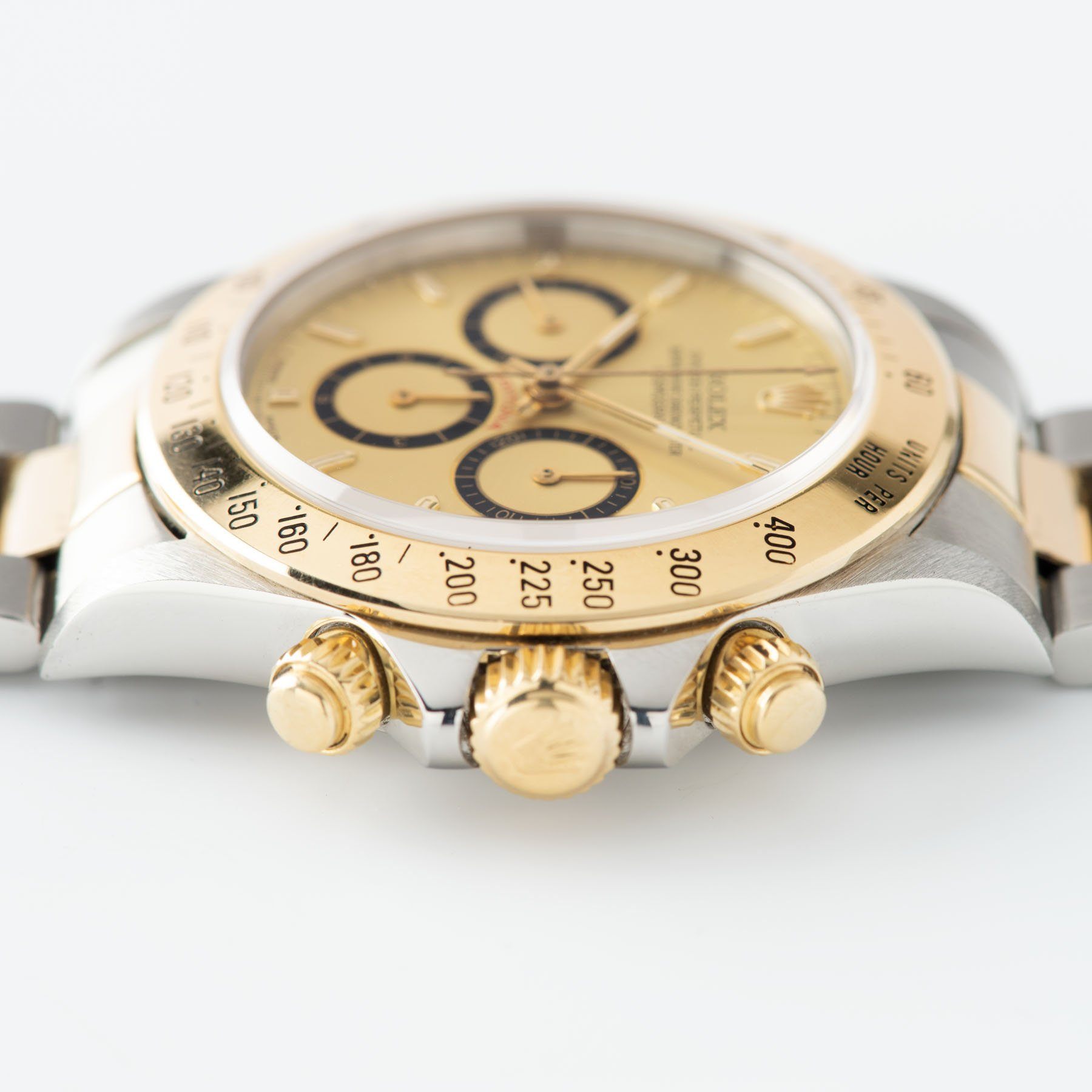 Rolex Daytona 16523 Champagne Four Line Dial with Papers