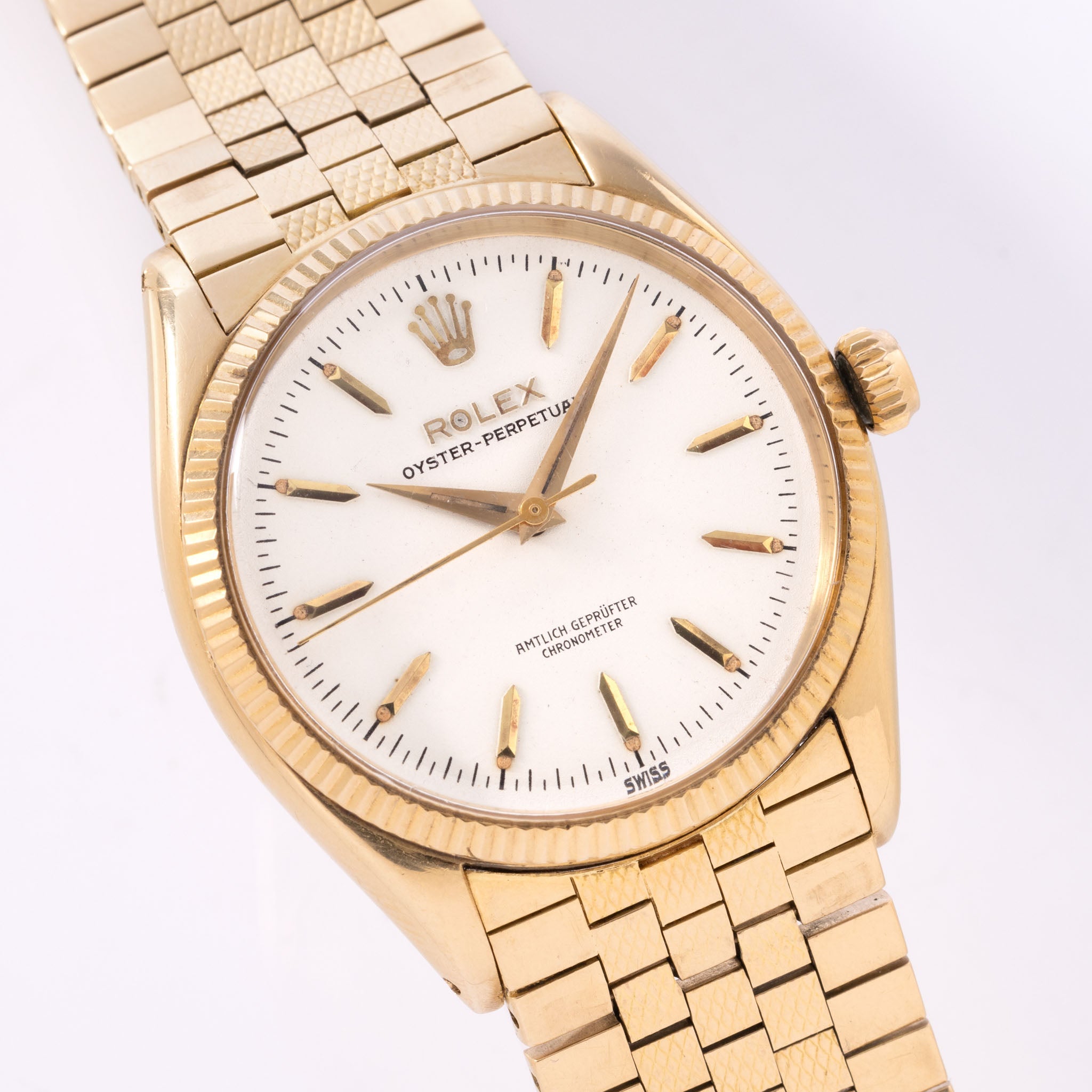 Rolex Oyster Perpetual 18kt Gold German Dial Brick Bracelet ref 6567