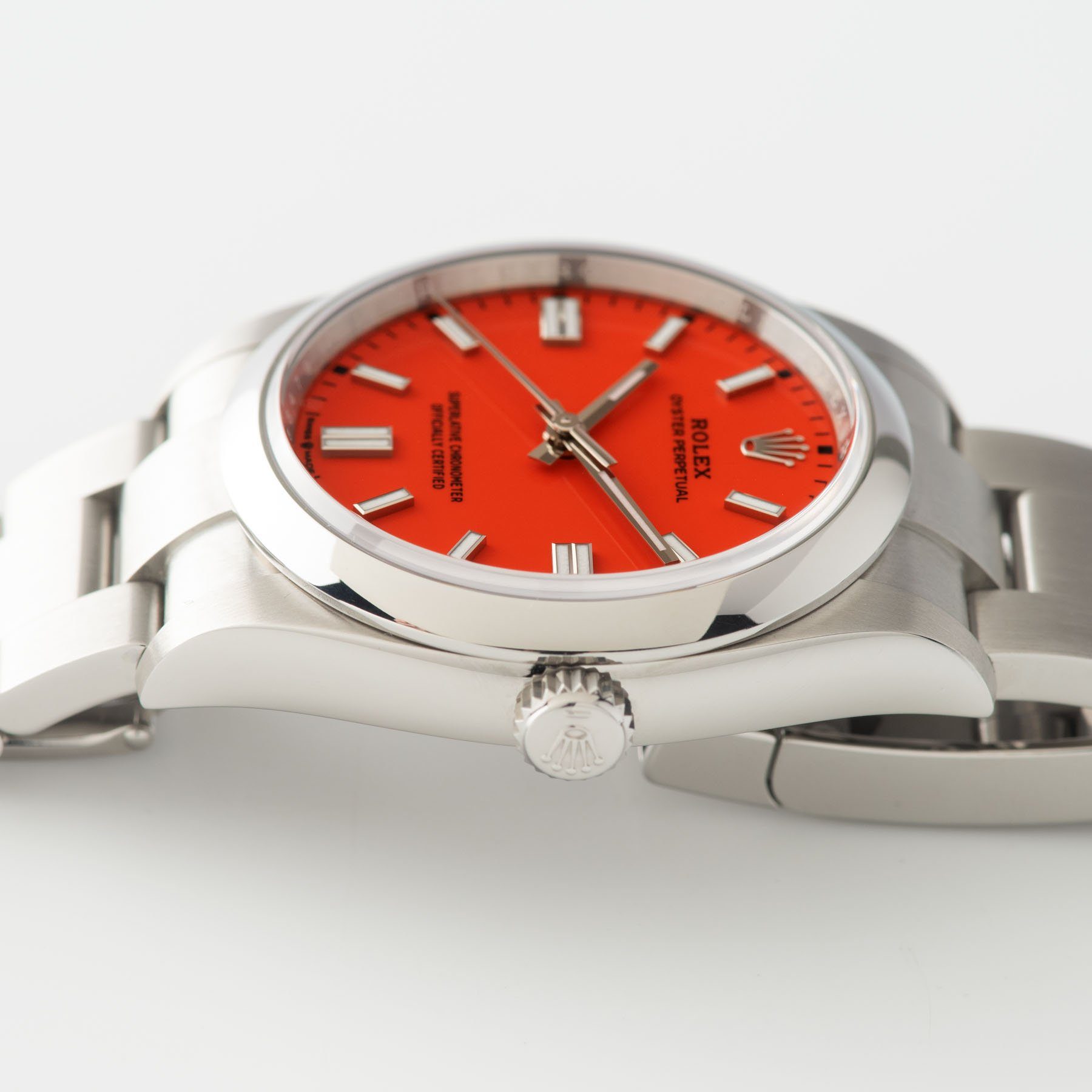 Rolex Oyster Perpetual Ref 126000 Coral Red Stella Dial