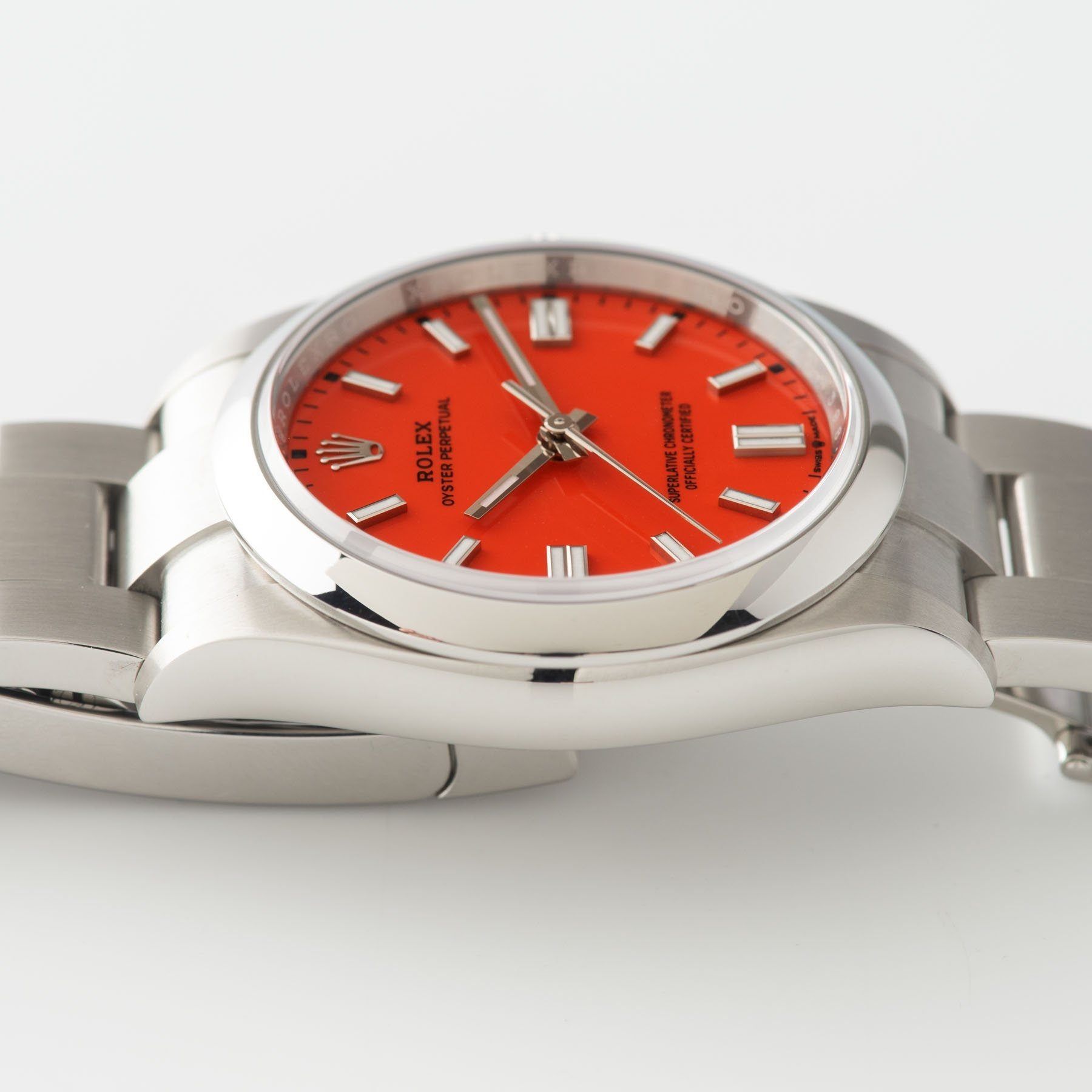 Rolex Oyster Perpetual Ref 126000 Coral Red Stella Dial