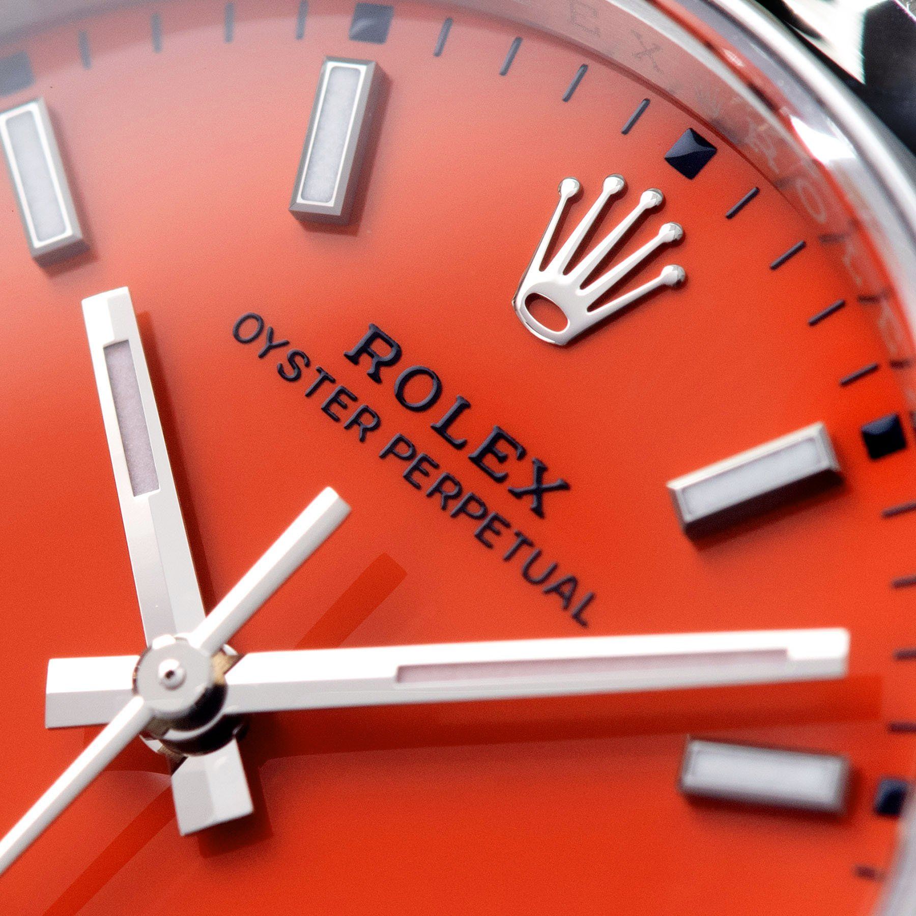 Rolex Oyster Perpetual Ref 126000 Coral Red Stella Dial