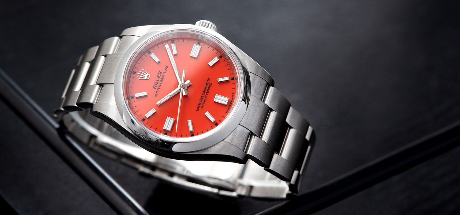 Rolex Oyster Perpetual Ref 126000 Coral Red Stella Dial