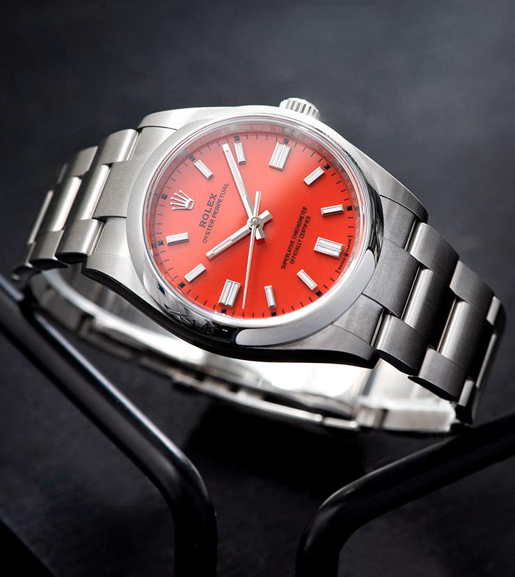 Rolex Oyster Perpetual Ref 126000 Coral Red Stella Dial