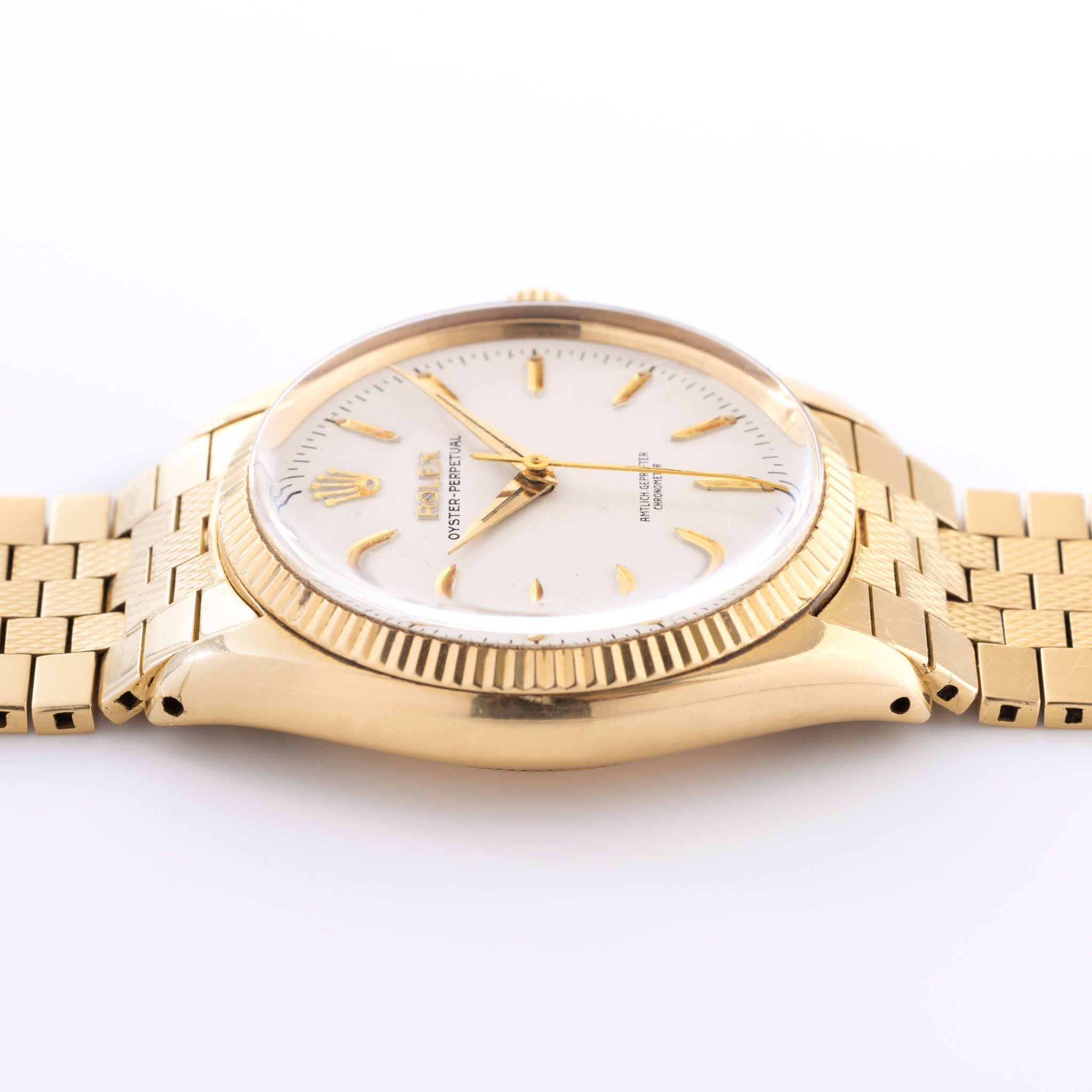 Rolex Oyster Perpetual 18kt Gold German Dial Brick Bracelet ref 6567