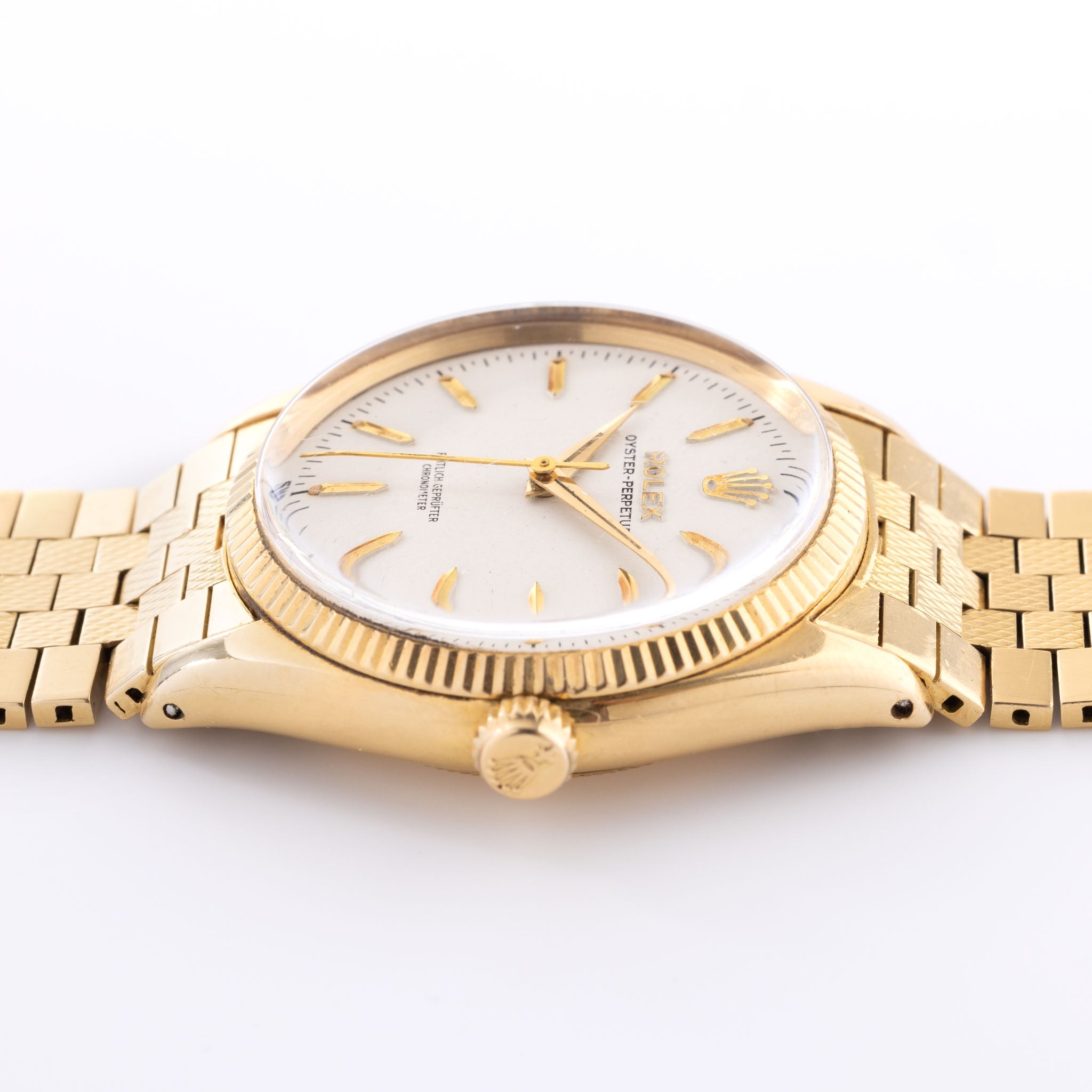 Rolex Oyster Perpetual 18kt Gold German Dial Brick Bracelet ref 6567