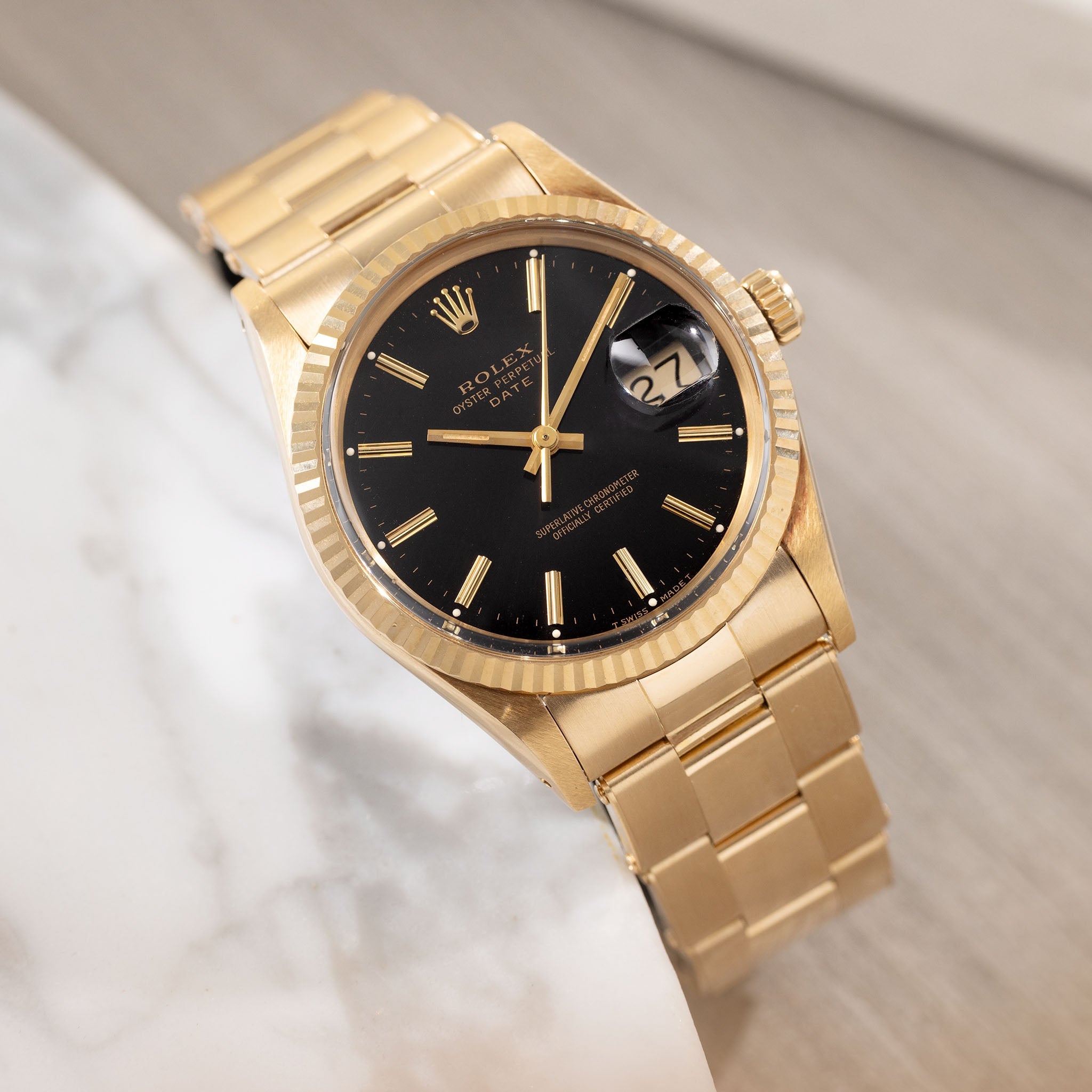 Rolex Oyster-perpetual date black dial  in 18 k yellow gold ref 15038