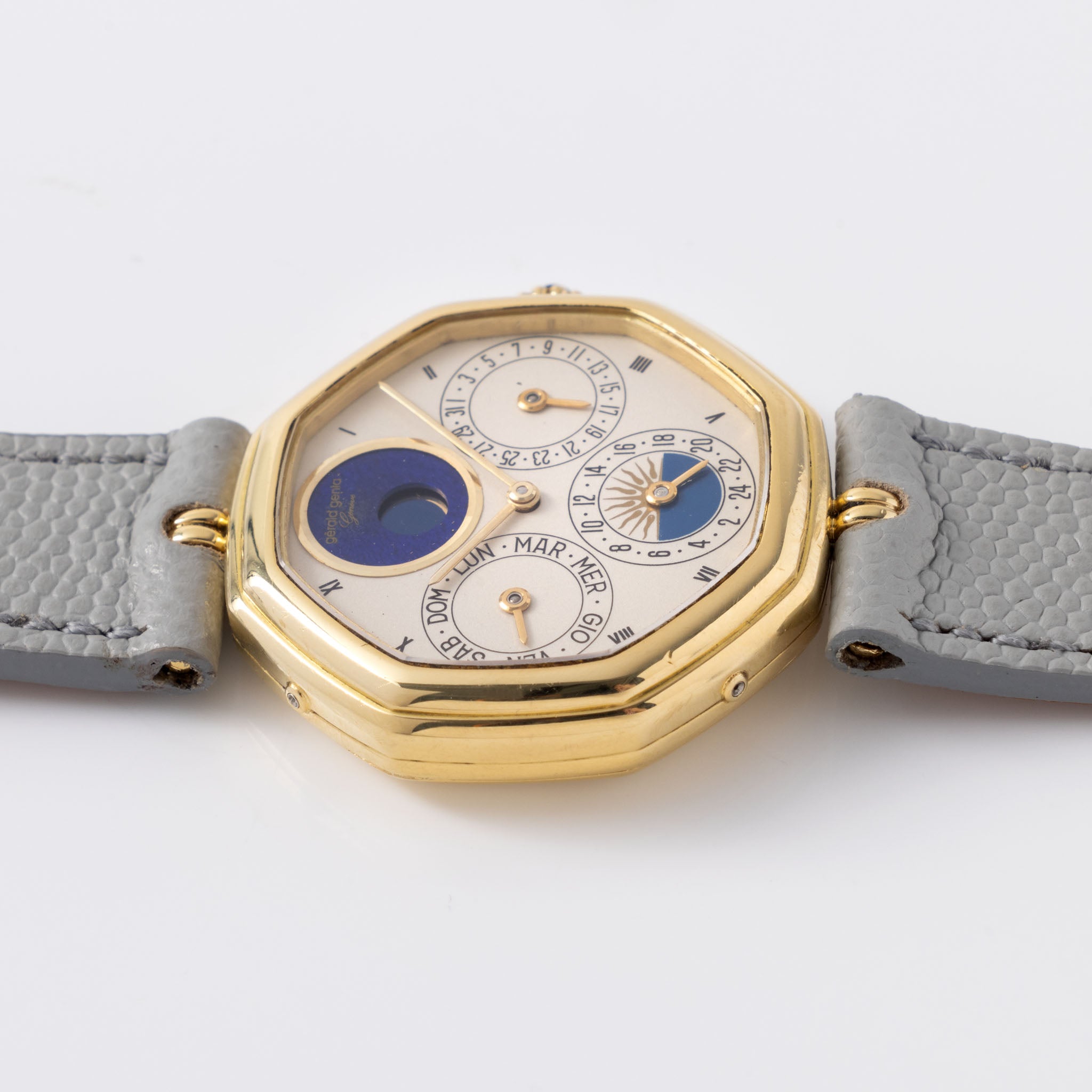 Gerald Genta “Succes “ Day date calendar moonphase with cream dial in 18 k yellow gold ref G2747