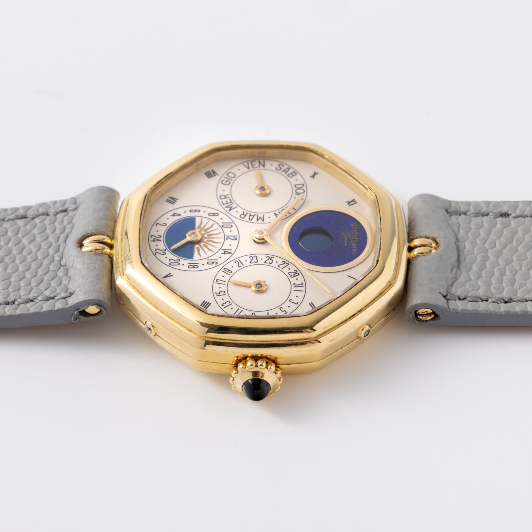 Gerald Genta “Succes “ Day date calendar moonphase with cream dial in 18 k yellow gold ref G2747