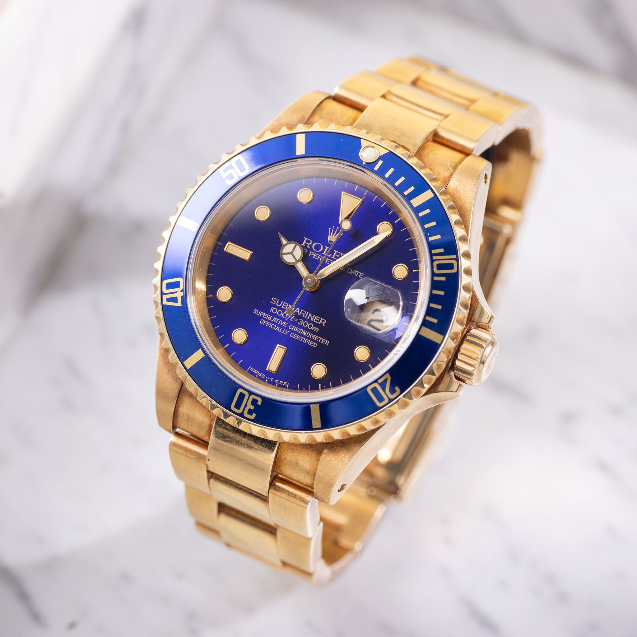 Rolex Submariner "Purple Dial" Ref. 16618 in 18k Yellow Gold with Original Warranty Paper