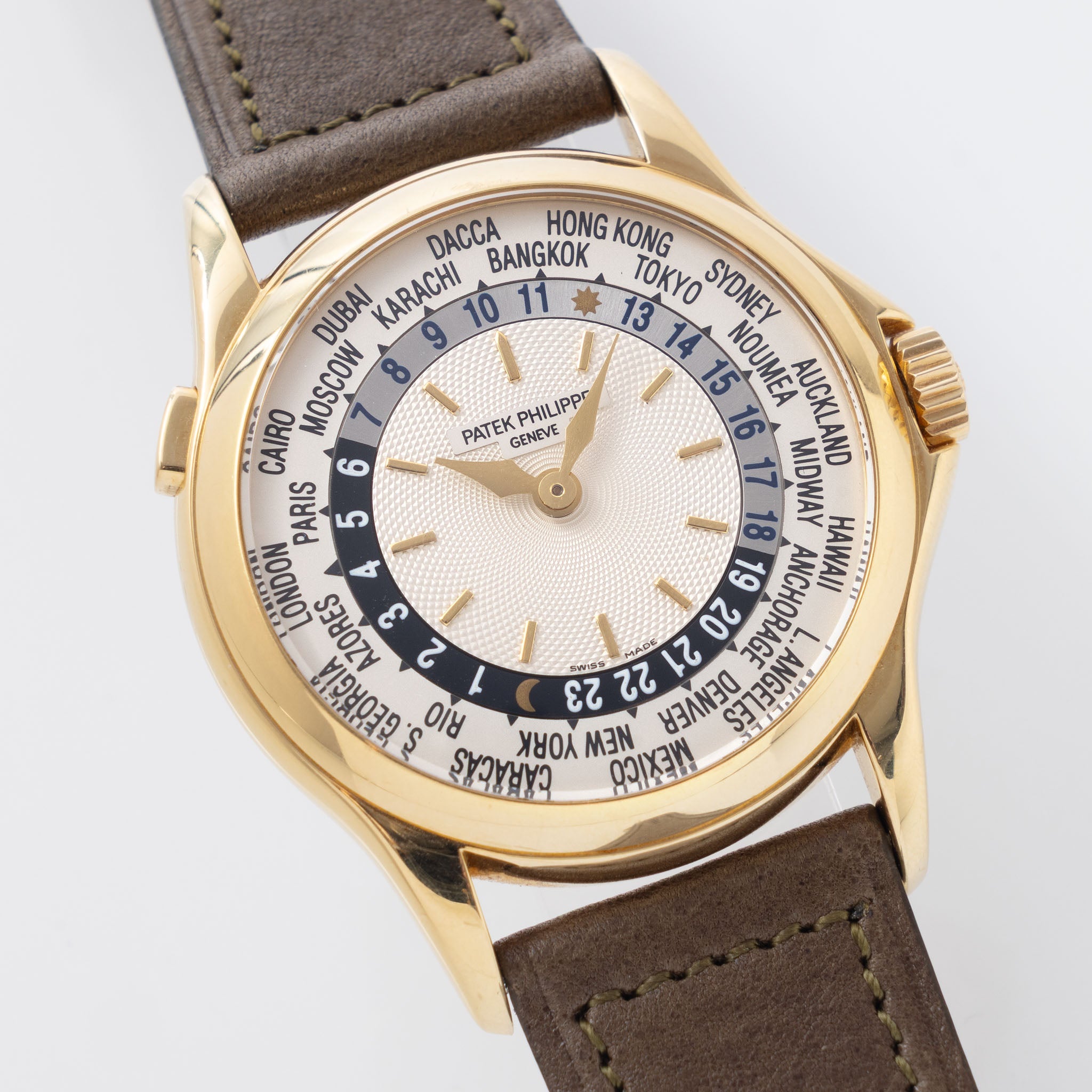Patek Philippe World Time 5110J Guilloche Dial in 18k Yellow Gold with Extract of the Archives 
