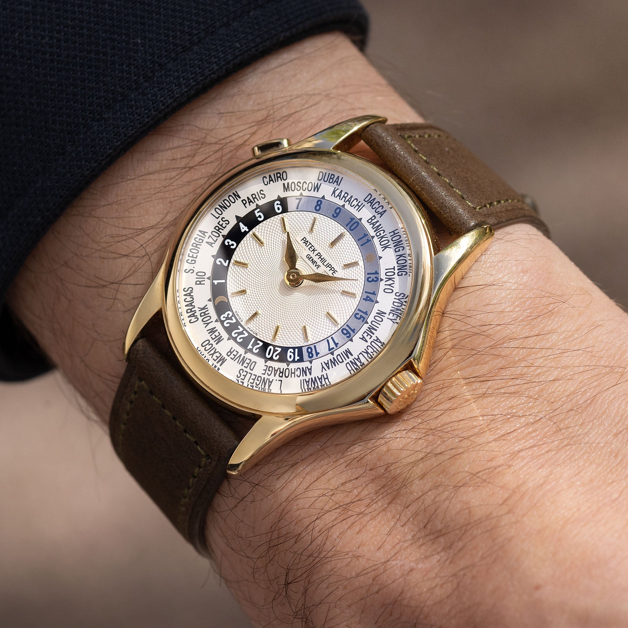 Patek Philippe World Time 5110J Guilloche Dial in 18k Yellow Gold with Extract of the Archives 

