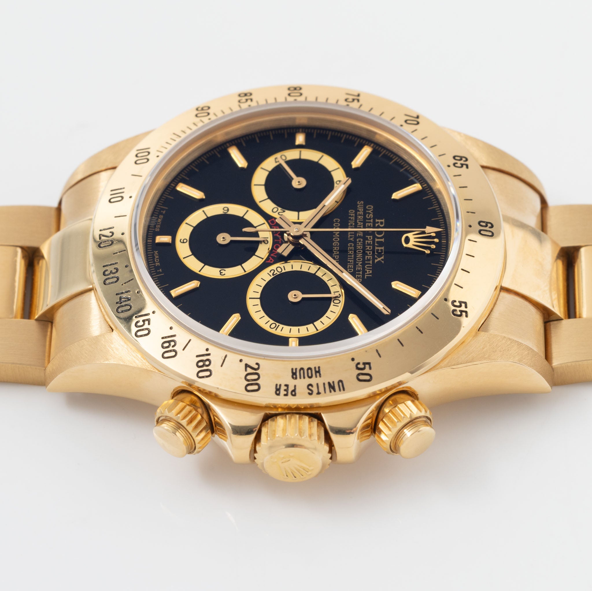 Rolex Cosmograph Daytona 16520 Black Floating Dial in 18k Yellow Gold with Original Guarantee Paper and Accessories
