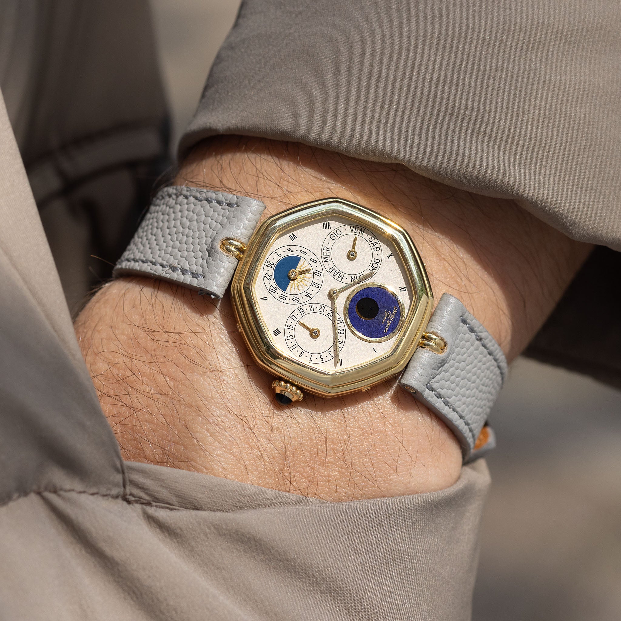 Gerald Genta “Succes “ Day date calendar moonphase with cream dial in 18 k yellow gold ref G2747